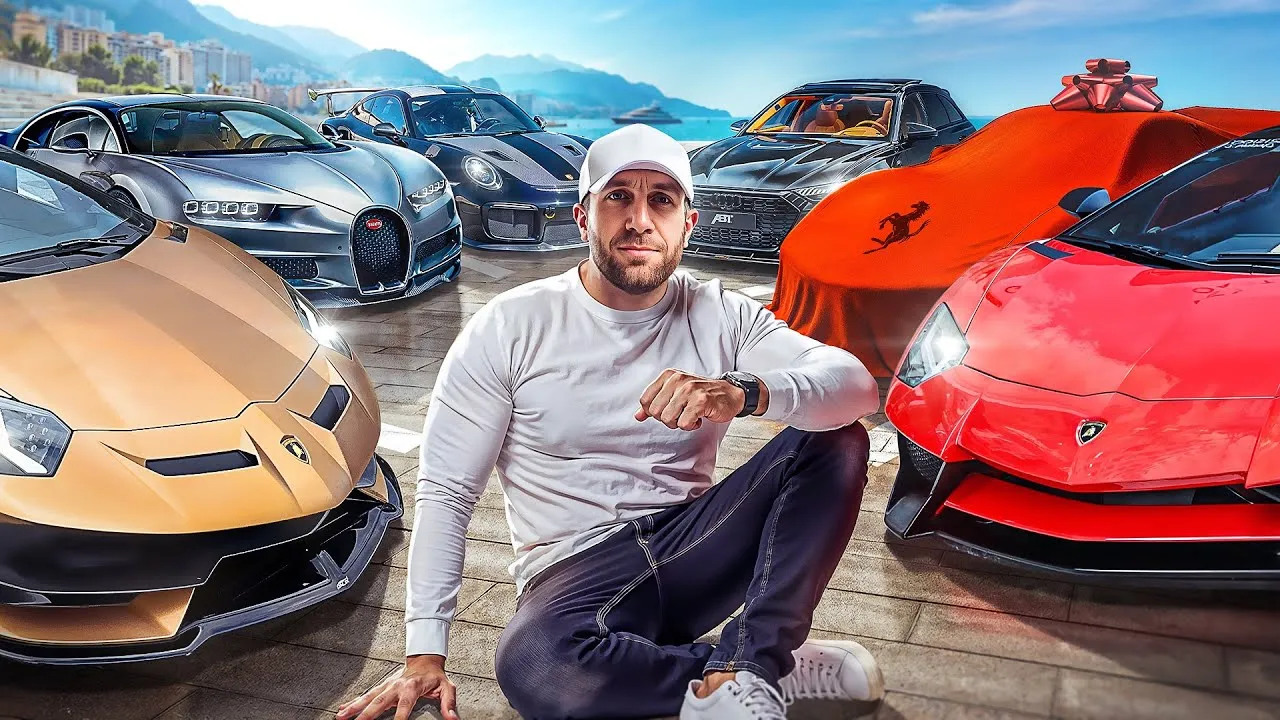 GMK entouré de plusieurs de ses bolides